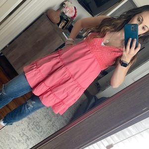 A dress but also worn as a summer top